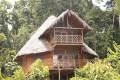 sani_lodge_familiar_cabin_exterior.jpg